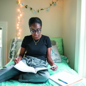 Resident room: Senior BOLD Scholar Arianna Paul studies on the second floor of the Borisenok House, where the seven members of the senior BOLD Scholar cohort live. The house was designed as a living-learning community and includes a kitchen area on the second floor for the Scholars to use.