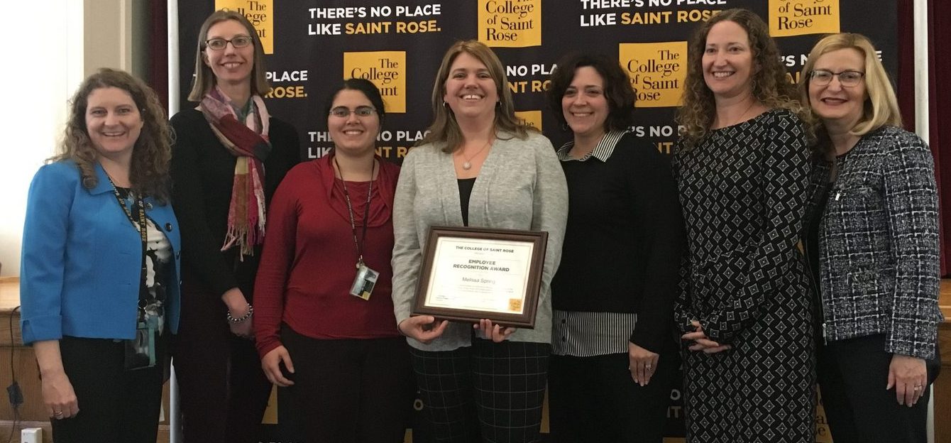 Melissa Spring, Coordinator of the Pauline K. Winkler Speech-Language-Hearing Clinic, with her nominators and Saint Rose President Carolyn J. Stefanco.