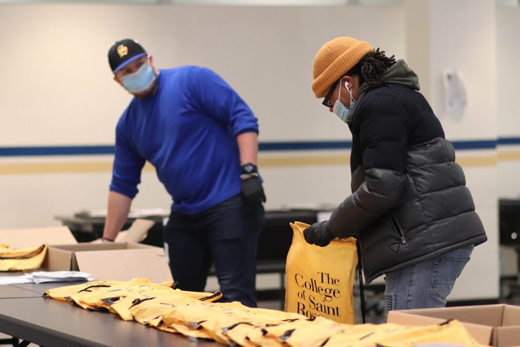 Chromebooks being distributed to students by the City School District of Albany were packed in Saint Rose backpacks donated by the College.