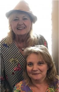 Nancy Vice ( Klein) standing and Roberta Williams