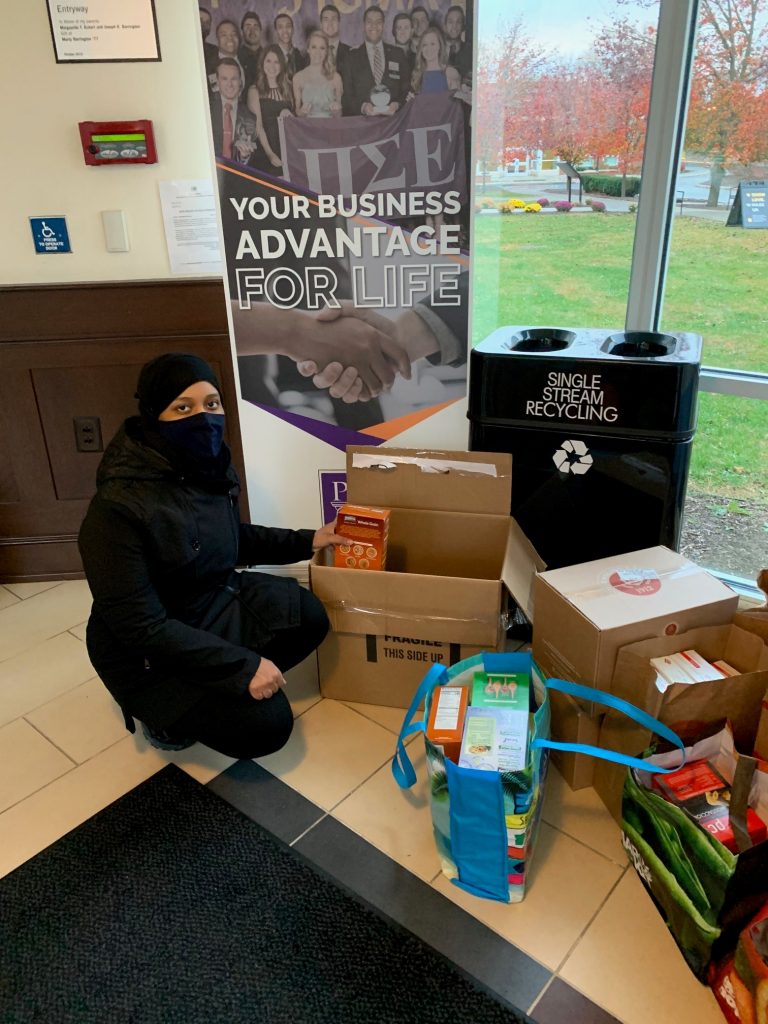 Huether School of Business student Suzanne Ibrahim with collection of pasta for Pasta Grab Challenge