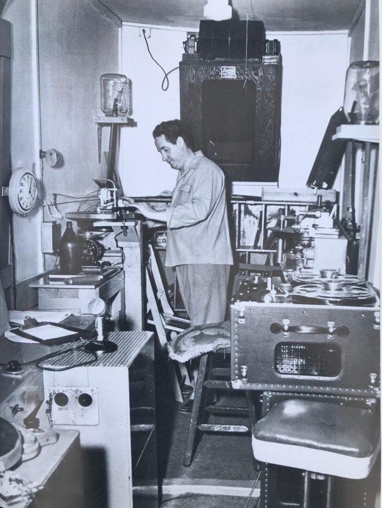 Les Paul working with recording equipment